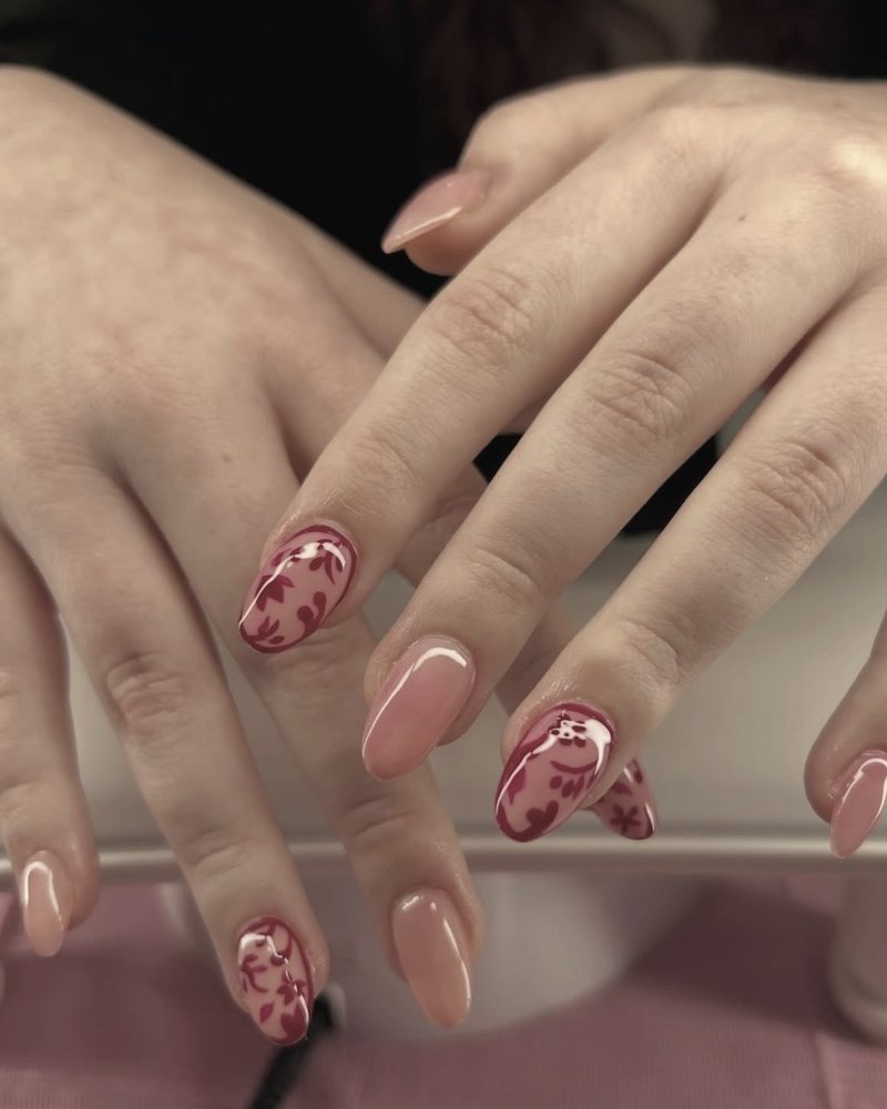 Hand-painted nail art on a gel set